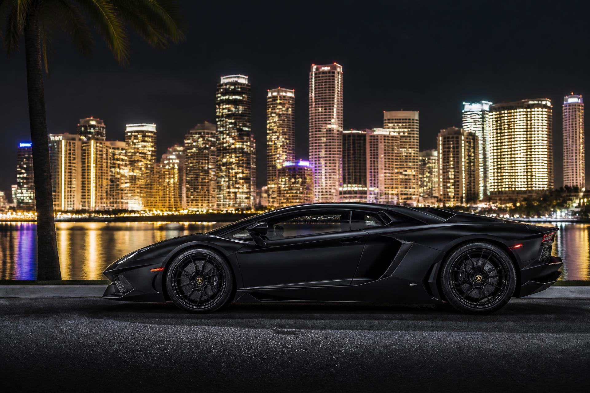 Black Lamborghini at Miami skyline